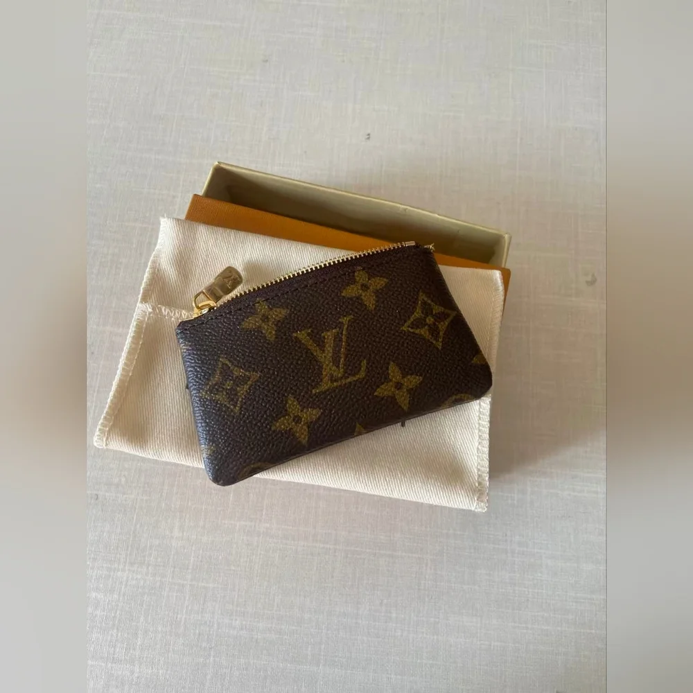 Louis Vuitton Monogram Zipped Key Pouch in Brown with Gold Hardware